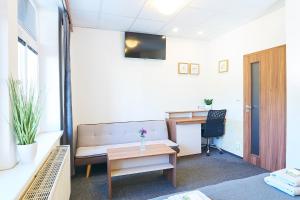 TV a/nebo společenská místnost v ubytování Wellness Hotel Kocanda