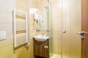 Koupelna v ubytování Wellness Hotel Kocanda
