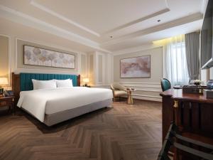 Voodi või voodid majutusasutuse L'Signature Hotel & Spa toas