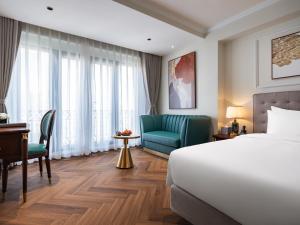Voodi või voodid majutusasutuse L'Signature Hotel & Spa toas