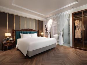 Voodi või voodid majutusasutuse L'Signature Hotel & Spa toas