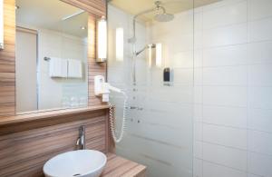 Kúpeľňa v ubytovaní Leonardo Hotel Vienna Hauptbahnhof