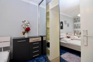 Posteľ alebo postele v izbe v ubytovaní Cozy Apartment FREE parking