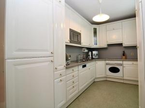 Kuchyňa alebo kuchynka v ubytovaní Cozy Apartment FREE parking