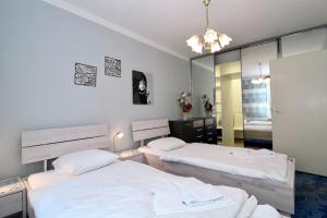 Posteľ alebo postele v izbe v ubytovaní Cozy Apartment FREE parking