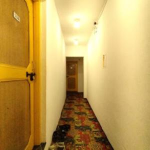 a long hallway with a corridorngthngthngthngthngthngthngthngthngthngth at Hotel City Way, Srinagar in Srinagar