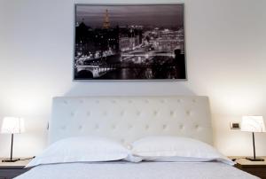A bed or beds in a room at Style Homes Brera San Marco 29