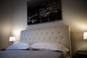 A bed or beds in a room at Style Homes Brera San Marco 29
