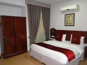 En eller flere senger på et rom på WANASA CONTINENTAL HOTEL