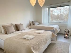 Postel nebo postele na pokoji v ubytování Arctic Luxury Apartment