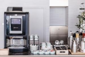 a coffee machine sitting on a counter in a kitchen at Limassol Del Mar in Limassol