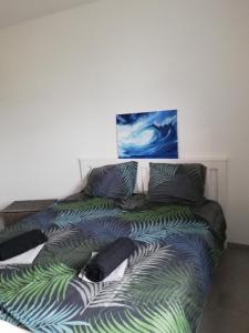 En eller flere senge i et værelse på Lauda i bric