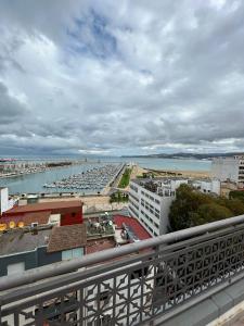 a view of a harbor from a balcony at Twin Hotel Tanger in Tangier