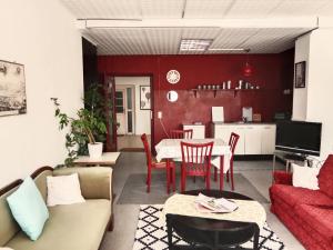 Televiisor ja/või meelelahutuskeskus majutusasutuses Lounge-Style-Hostel