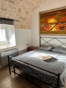 Postel nebo postele na pokoji v ubytování Trullo Sofia + 7 fotografií