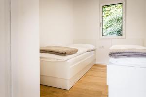 Postel nebo postele na pokoji v ubytování Die Bludenzerin + 37 fotografií