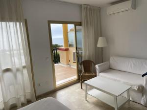 Posteľ alebo postele v izbe v ubytovaní Estudio con insuperables vistas al Mar: Aparcamiento