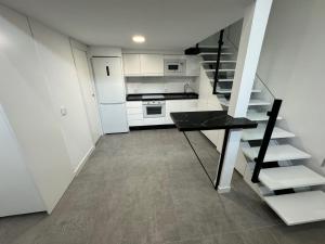 Kuchyň nebo kuchyňský kout v ubytování Apartamento tipo Dúplex - NO SE ADMITEN MASCOTAS, NO PETS
