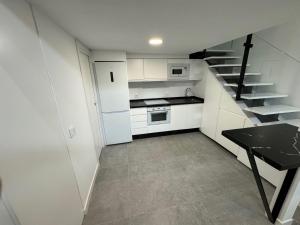 Kuchyň nebo kuchyňský kout v ubytování Apartamento tipo Dúplex - NO SE ADMITEN MASCOTAS, NO PETS