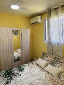 Postel nebo postele na pokoji v ubytování Résidence Lacolombe + 13 fotografií