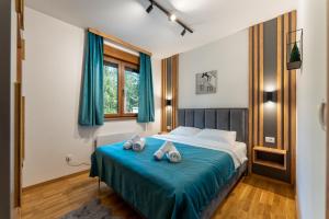 Krevet ili kreveti u jedinici u objektu Apartman Zelenbor 4 Vila Zlatibor Luxury&Spa