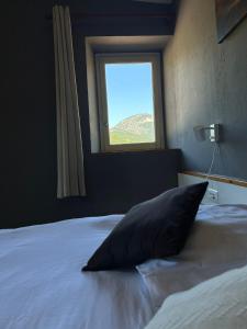 Postel nebo postele na pokoji v ubytování Auberge du désert