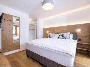 Katil atau katil-katil dalam bilik di Apartment Comfort Bergblick 04 by Interhome