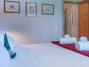 Letto o letti in una camera di Apartment Victoria 1 D2 by Interhome