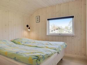 Postel nebo postele na pokoji v ubytování Holiday Home Adelmine - 600m from the sea in Lolland- Falster and Mon by Interhome