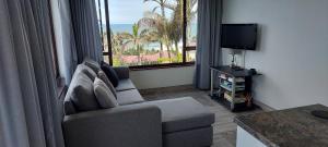 TV a/nebo společenská místnost v ubytování Ramsgate Ocean View