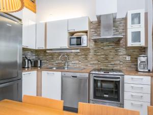 Kuchyň nebo kuchyňský kout v ubytování Holiday Home Nilikuru a1 by Interhome + 15 fotografií