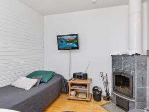 TV a/nebo společenská místnost v ubytování Holiday Home Moitakuru a18 by Interhome