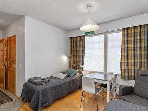 Ένα ή περισσότερα κρεβάτια σε δωμάτιο στο Holiday Home Moitakuru a18 by Interhome