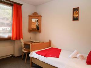 Postel nebo postele na pokoji v ubytování Apartment Parnier by Interhome