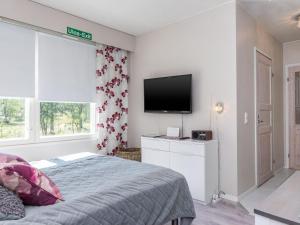 En eller flere senge i et værelse på Holiday Home Moitakuru a17 by Interhome