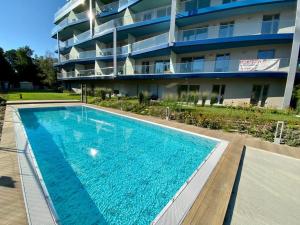 Bazén v ubytování HelloBalaton Apartman nebo v jeho okolí