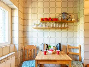 Příslušenství pro přípravu čaje a kávy v ubytování Apartment Punta Grumo 2 by Interhome
