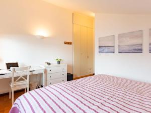 Postel nebo postele na pokoji v ubytování Apartment Punta Grumo 2 by Interhome