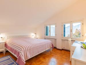 Postel nebo postele na pokoji v ubytování Apartment Punta Grumo 2 by Interhome
