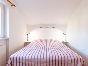 Postel nebo postele na pokoji v ubytování Apartment Punta Grumo 2 by Interhome