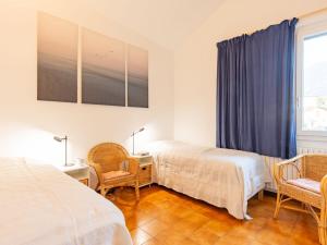 Postel nebo postele na pokoji v ubytování Apartment Punta Grumo 2 by Interhome