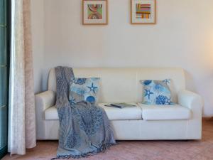 A seating area at Apartment L'Oasi Bilo A1 by Interhome