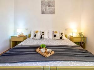 A bed or beds in a room at Apartment L'Oasi Bilo A1 by Interhome