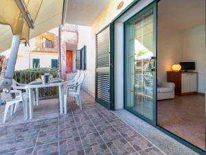 A balcony or terrace at Apartment L'Oasi Bilo A1 by Interhome
