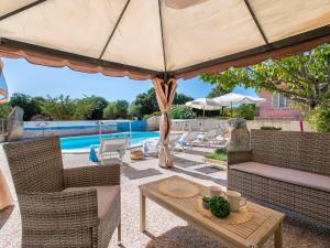 The swimming pool at or close to Apartment L'Oasi Bilo A1 by Interhome
