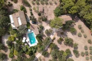 an aerial view of a house with a pool at Villa Maya in Puget