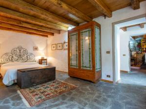 Ένα ή περισσότερα κρεβάτια σε δωμάτιο στο Holiday Home I 3 Faggi by Interhome