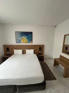 Posteľ alebo postele v izbe v ubytovaní Twin Hotel Tanger