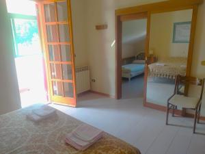 Letto o letti in una camera di Casa BnB Pappappero Monti della Laga