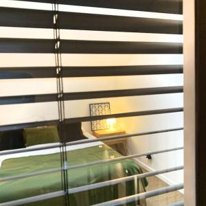 Ένα ή περισσότερα κρεβάτια σε δωμάτιο στο Appartement Paris by La Boîte En Plus +23 φωτογραφίες